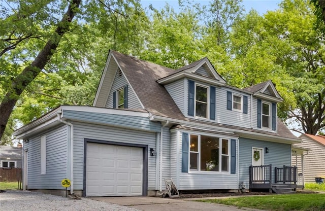 506 W 86th St, Kansas City, MO 64114 - view of front of house featuring a garage, driveway, and a shingled roof