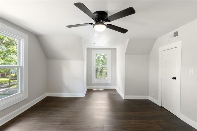 506 W 86th St, Kansas City, MO 64114 - additional living space featuring lofted ceiling, baseboards, a ceiling fan, and dark wood-style floors