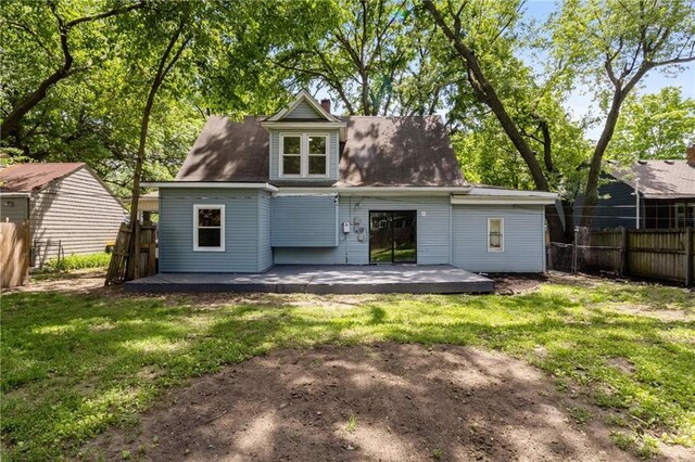 506 W 86th St, Kansas City, MO 64114 - back of house featuring a patio area