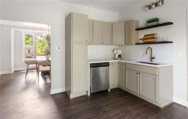 506 W 86th St, Kansas City, MO 64114 - kitchen with stainless steel dishwasher, open shelves, a sink, light countertops, and tasteful backsplash