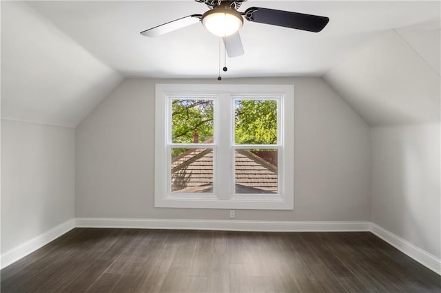 506 W 86th St, Kansas City, MO 64114 - additional living space featuring lofted ceiling, dark wood-style flooring, ceiling fan, and baseboards