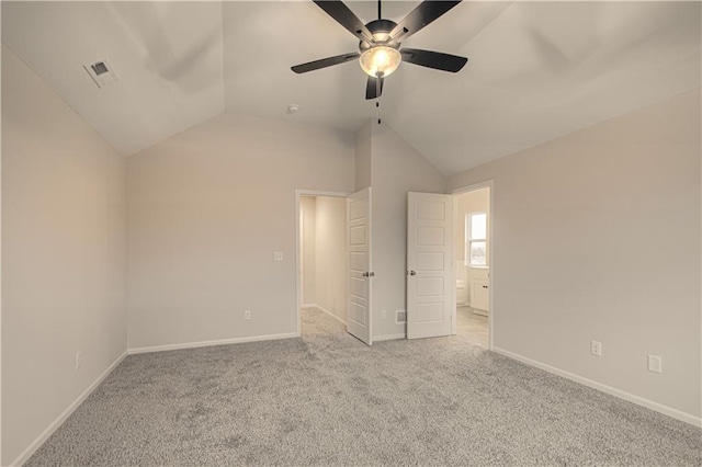 6106 NE 118th St, Kansas City, MO 64156 - unfurnished bedroom with lofted ceiling, carpet floors, baseboards, ceiling fan, and connected bathroom