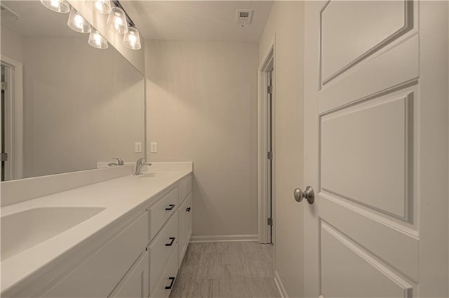 6106 NE 118th St, Kansas City, MO 64156 - full bath with baseboards and double vanity