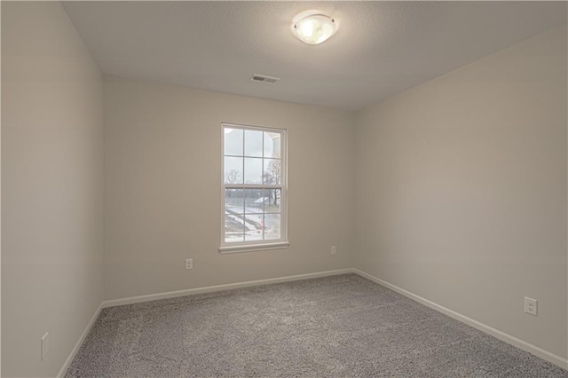 6106 NE 118th St, Kansas City, MO 64156 - carpeted spare room featuring baseboards