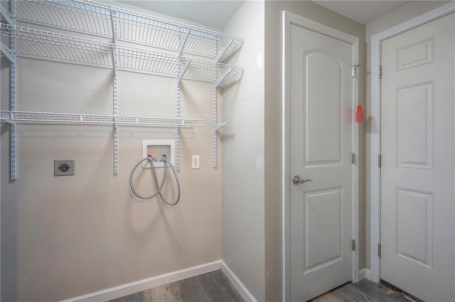 507 W 26th St, Higginsville, MO 64037 - laundry area featuring hookup for a washing machine, hookup for an electric dryer, baseboards, and wood finished floors