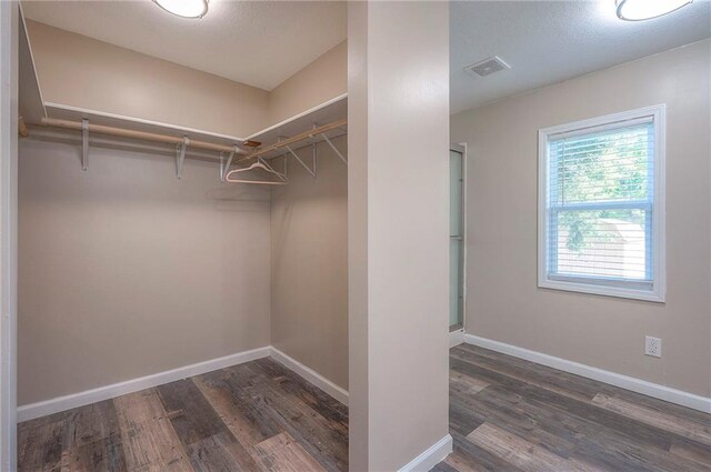 507 W 26th St, Higginsville, MO 64037 - walk in closet featuring wood finished floors