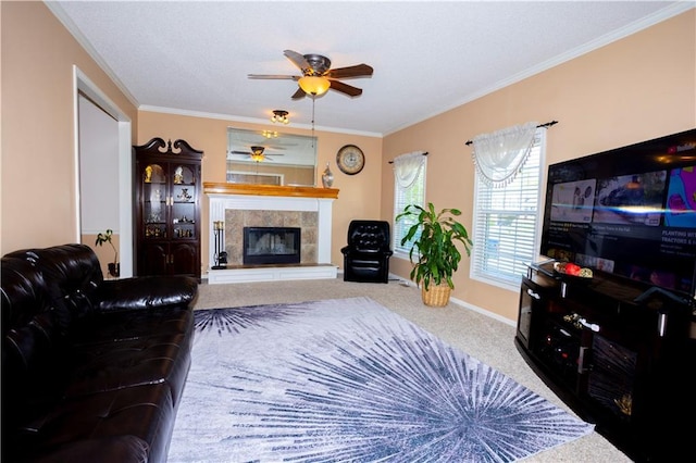 16366 S Hunter St, Olathe, KS 66062 - living room with a ceiling fan, carpet, crown molding, and a tiled fireplace