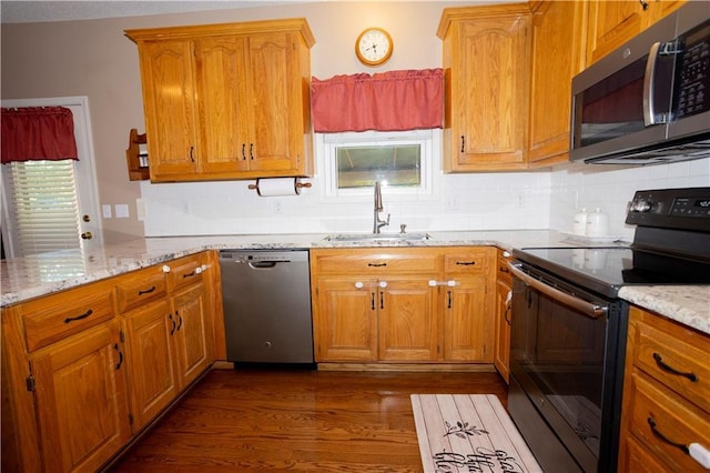 16366 S Hunter St, Olathe, KS 66062 - kitchen with stainless steel appliances, a sink, plenty of natural light, and dark wood finished floors