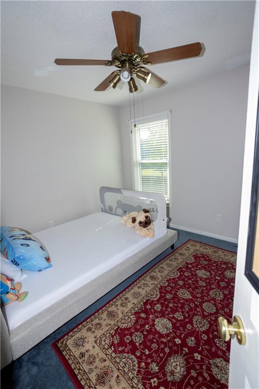 16366 S Hunter St, Olathe, KS 66062 - bedroom featuring a ceiling fan