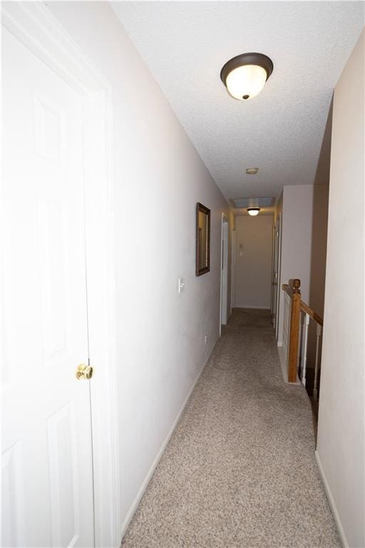 16366 S Hunter St, Olathe, KS 66062 - hallway with light carpet, baseboards, and an upstairs landing