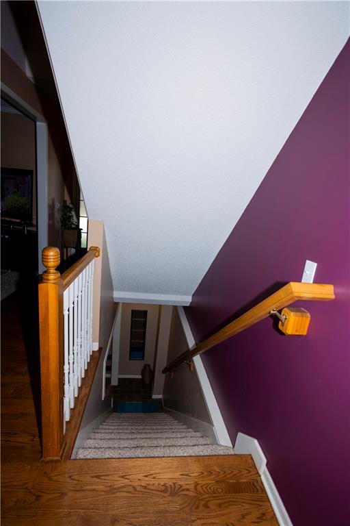 16366 S Hunter St, Olathe, KS 66062 - stairs featuring baseboards and wood finished floors