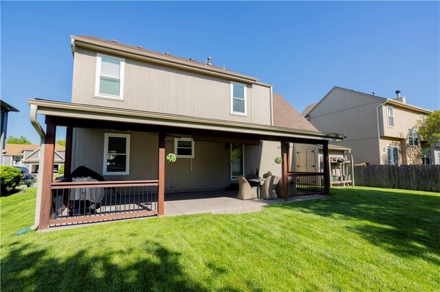 16366 S Hunter St, Olathe, KS 66062 - back of property featuring a patio area