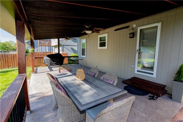 16366 S Hunter St, Olathe, KS 66062 - view of patio with fence, a ceiling fan, outdoor dining space, entry steps, and area for grilling