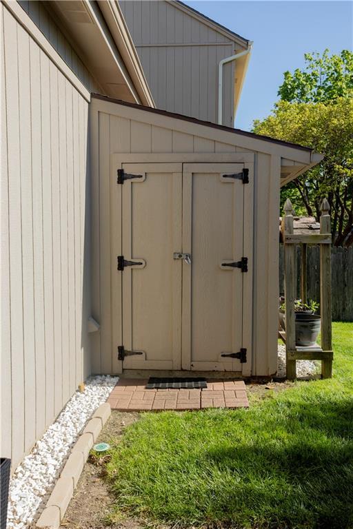 16366 S Hunter St, Olathe, KS 66062 - view of shed with fence