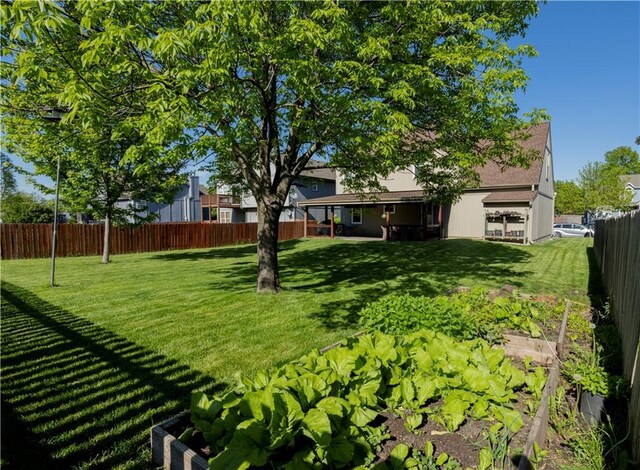 16366 S Hunter St, Olathe, KS 66062 - view of yard with a vegetable garden