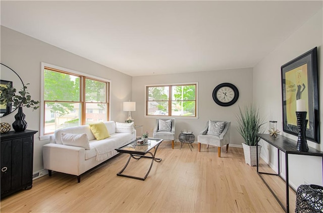 4547 Wyoming St, Kansas City, MO 64111 - living area with light wood-style flooring and baseboards