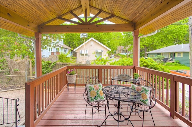 4547 Wyoming St, Kansas City, MO 64111 - wooden deck featuring a residential view, fence, a gazebo, and outdoor dining area