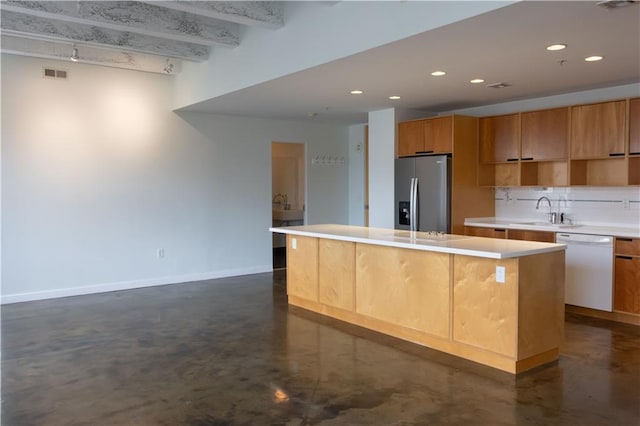 kitchen with stainless steel refrigerator with ice dispenser, white dishwasher, finished concrete flooring, a kitchen island, and recessed lighting