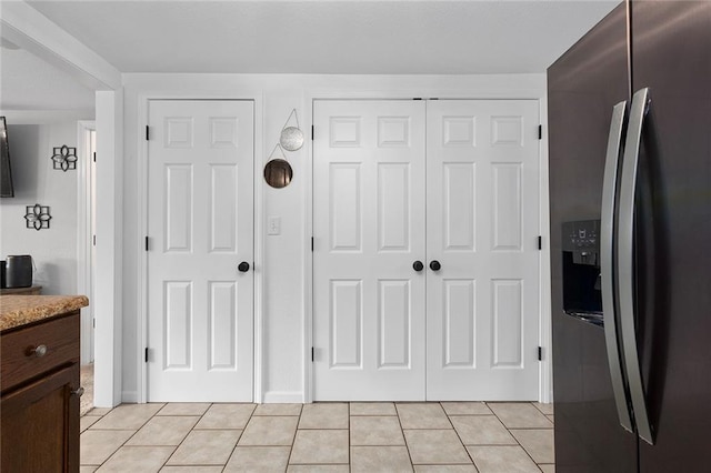 interior space featuring light tile patterned flooring