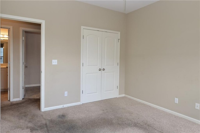21962 W 116th Ter, Olathe, KS 66061 - unfurnished bedroom featuring carpet flooring and a closet
