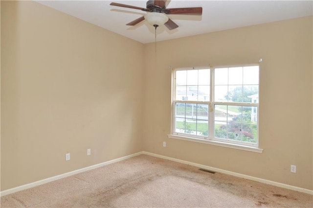 21962 W 116th Ter, Olathe, KS 66061 - spare room featuring carpet floors and ceiling fan
