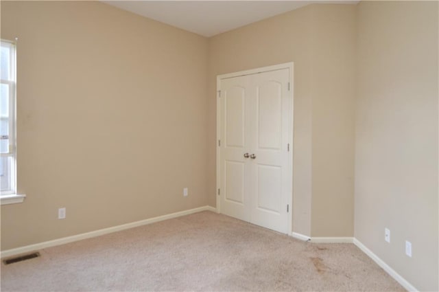 21962 W 116th Ter, Olathe, KS 66061 - unfurnished room featuring carpet and baseboards