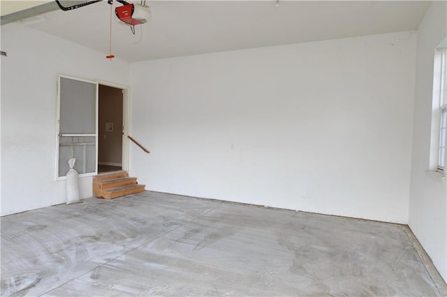 21962 W 116th Ter, Olathe, KS 66061 - unfurnished room featuring concrete flooring and stairs