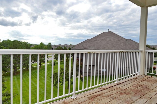 21962 W 116th Ter, Olathe, KS 66061 - wooden terrace with a lawn