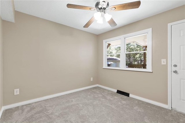 522 E Fair Ave, Independence, MO 64055 - carpeted spare room featuring ceiling fan and baseboards