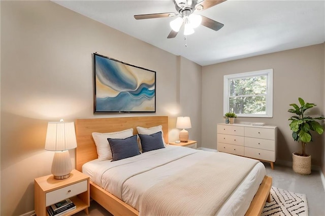 522 E Fair Ave, Independence, MO 64055 - bedroom with ceiling fan and baseboards