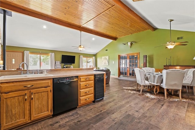 kitchen featuring dishwasher, open floor plan, a sink, and a ceiling fan