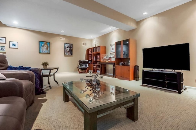 living room with carpet floors and recessed lighting