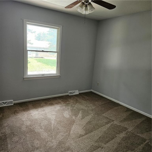 8413-8415 E 170th St, Belton, MO 64012 - spare room with a ceiling fan, carpet floors, healthy amount of natural light, and baseboards