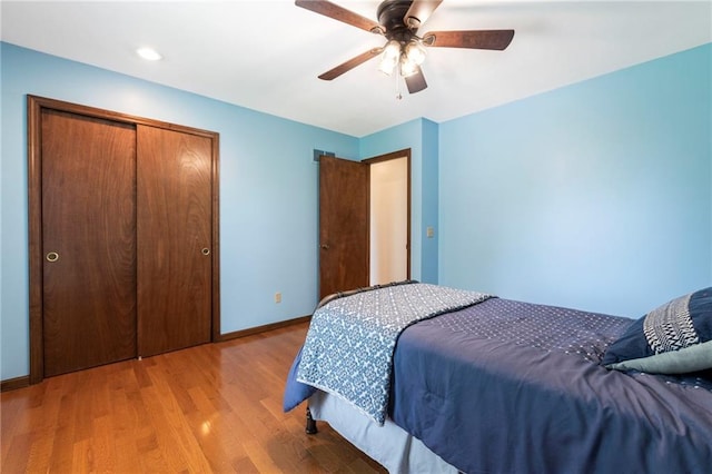 16280 Nall Ave, Stilwell, KS 66085 - bedroom with light wood-style floors, a closet, and ceiling fan