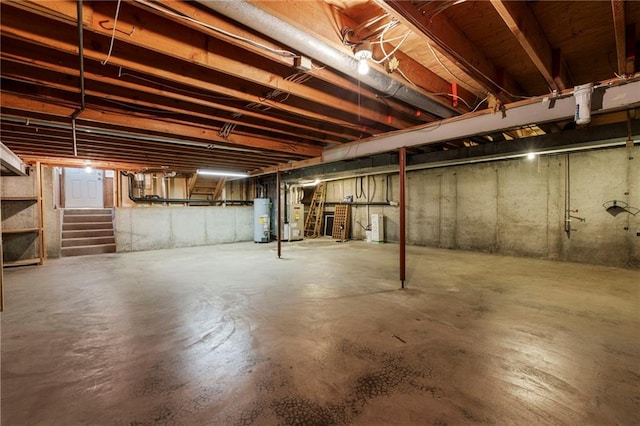 16280 Nall Ave, Stilwell, KS 66085 - unfinished basement featuring gas water heater, stairway, and water heater