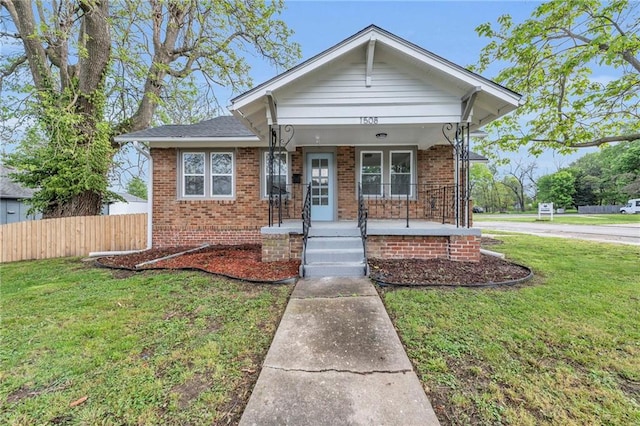 1508 SW Smith St, Blue Springs, MO 64015 - view of front of house with brick siding and covered porch
