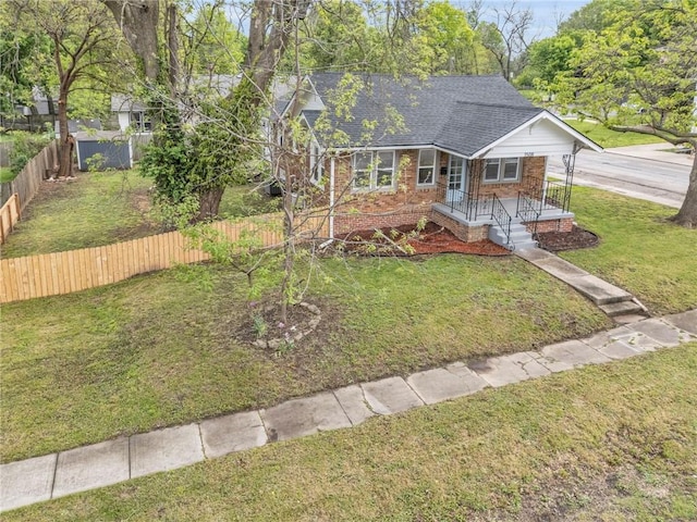 1508 SW Smith St, Blue Springs, MO 64015 - view of front of home with brick siding, a shingled roof, and a porch