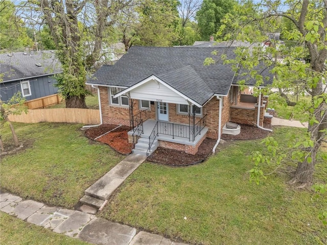1508 SW Smith St, Blue Springs, MO 64015 - single story home with a shingled roof, brick siding, and covered porch
