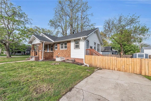 1508 SW Smith St, Blue Springs, MO 64015 - view of front of house with brick siding and covered porch
