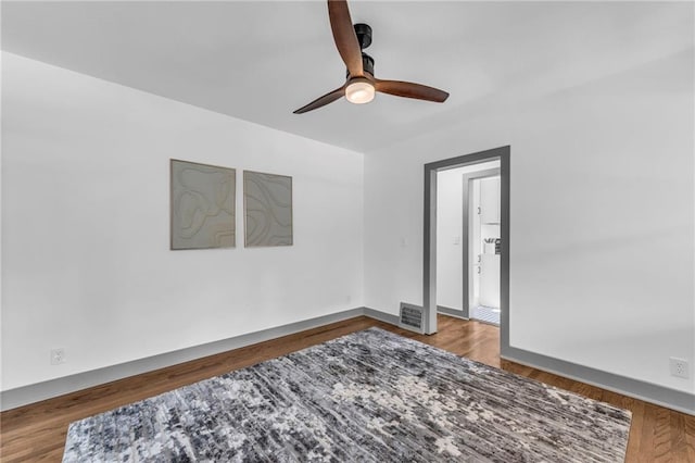 1508 SW Smith St, Blue Springs, MO 64015 - empty room featuring ceiling fan and baseboards