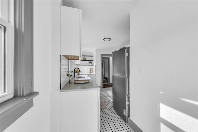 1508 SW Smith St, Blue Springs, MO 64015 - hallway featuring a sink