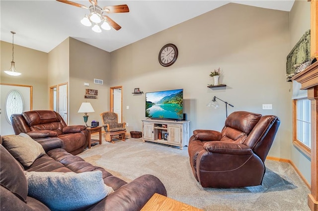 living room with carpet, a ceiling fan, high vaulted ceiling, and baseboards