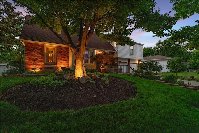 8822 Hadley St, Overland Park, KS 66212 - view of front of home featuring a front yard and brick siding