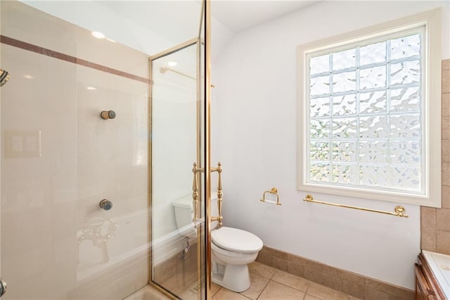 8822 Hadley St, Overland Park, KS 66212 - bathroom featuring a stall shower, vanity, and tile patterned floors