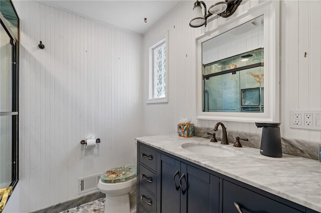 8822 Hadley St, Overland Park, KS 66212 - full bathroom with a shower with shower door and vanity
