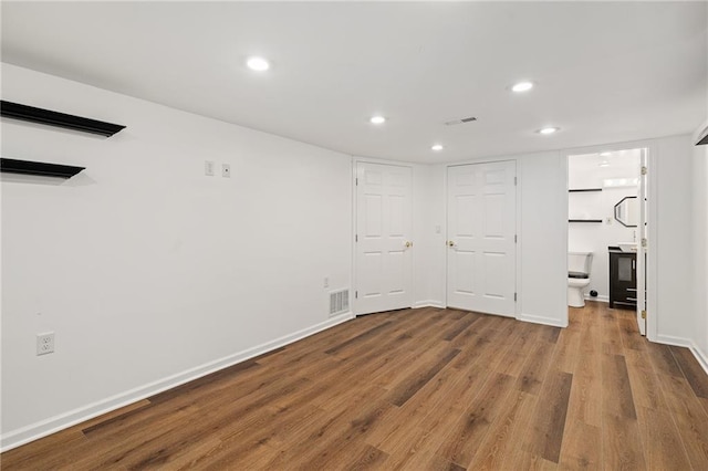 8822 Hadley St, Overland Park, KS 66212 - finished below grade area with recessed lighting and wood finished floors