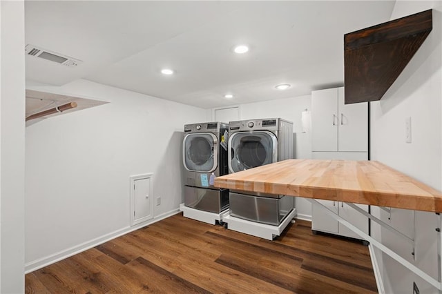 8822 Hadley St, Overland Park, KS 66212 - laundry room featuring washer and clothes dryer, dark wood-type flooring, and recessed lighting