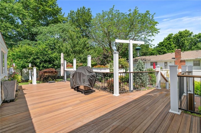 8822 Hadley St, Overland Park, KS 66212 - wooden terrace with grilling area