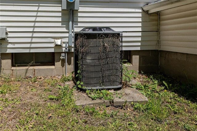 906 W Pearl St, Savannah, MO 64485 - exterior view of central air condition unit and electric meter