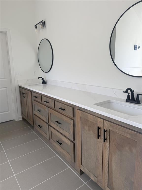 8913 N Colorado Ave, Kansas City, MO 64156 - full bathroom with double vanity and tile patterned flooring